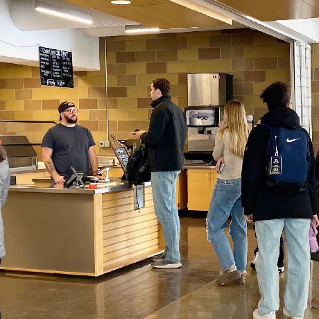MARRs Cafe - Line of students waiting to order food at cashier station